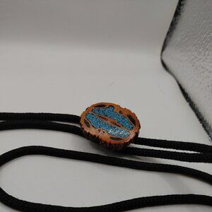 Bolo tie Walnut  Hazelnut halves filled W/crushed Turquoise Stones Braided tie